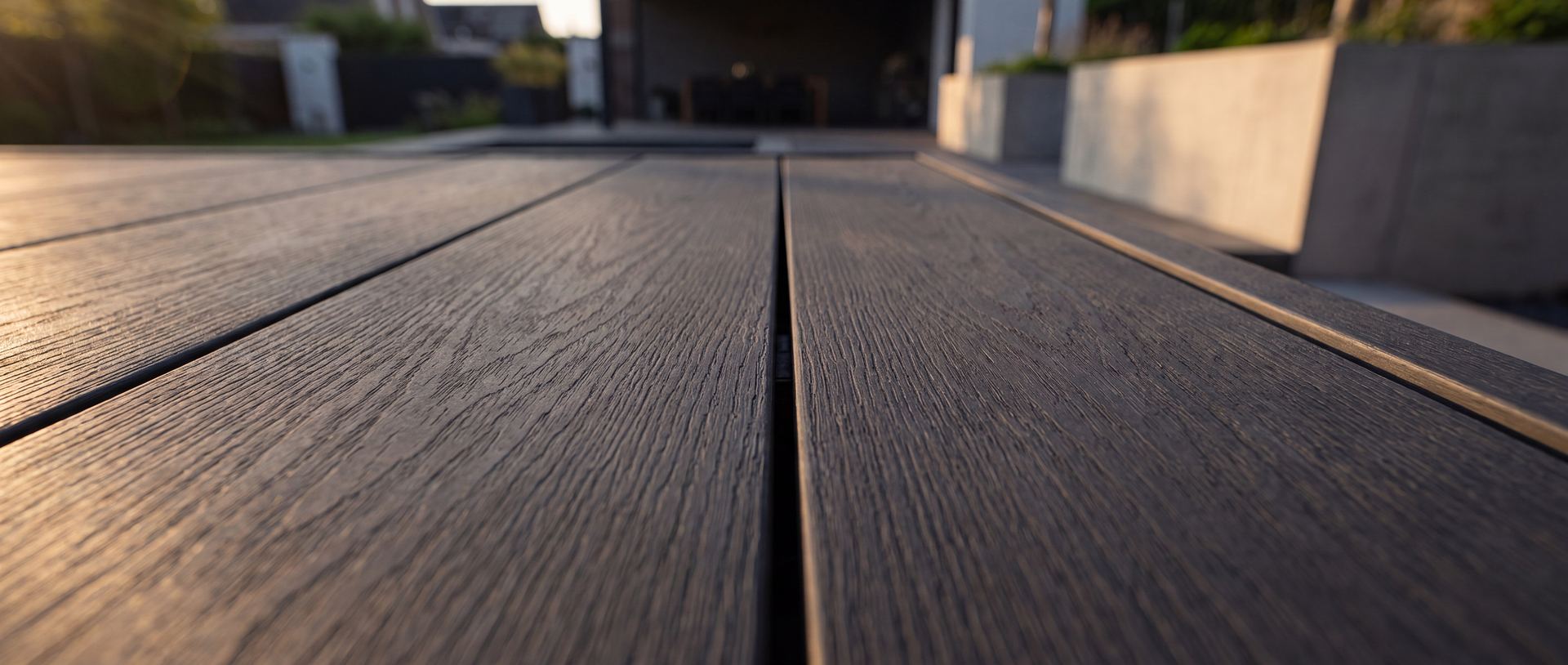 A covered patio and outdoor living space built by VIBE Construction