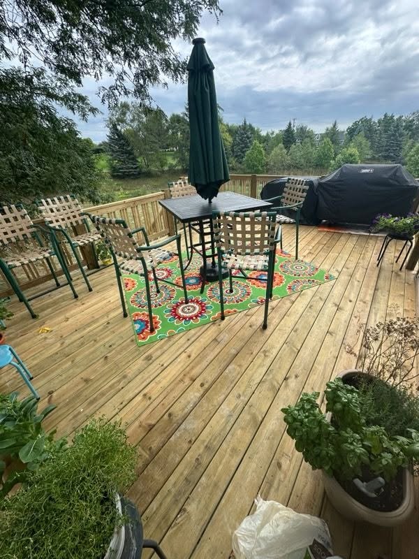 Pine Deck with Staircase to Concrete Patio & Dining Area — thumbnail 4