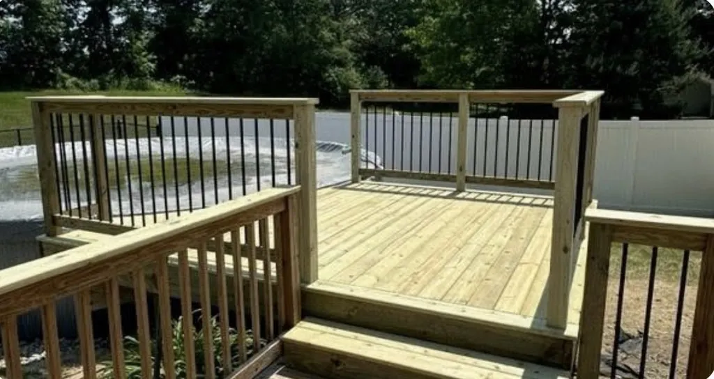 Pool Deck Addition with Black Steel Balusters