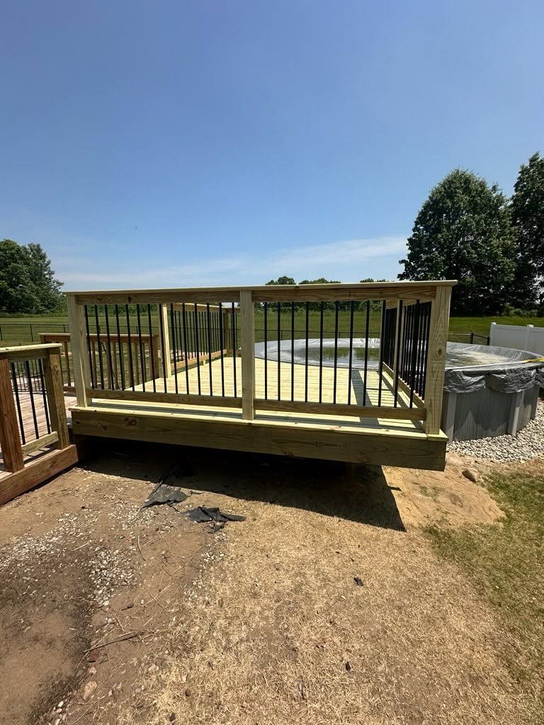 Pool Deck Addition with Black Steel Balusters — thumbnail 2