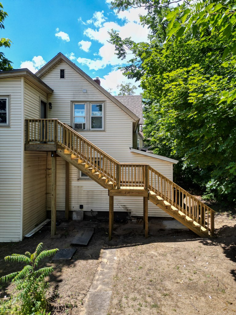 Pressure-Treated Switchback Staircase with Dual Platforms — photo 1