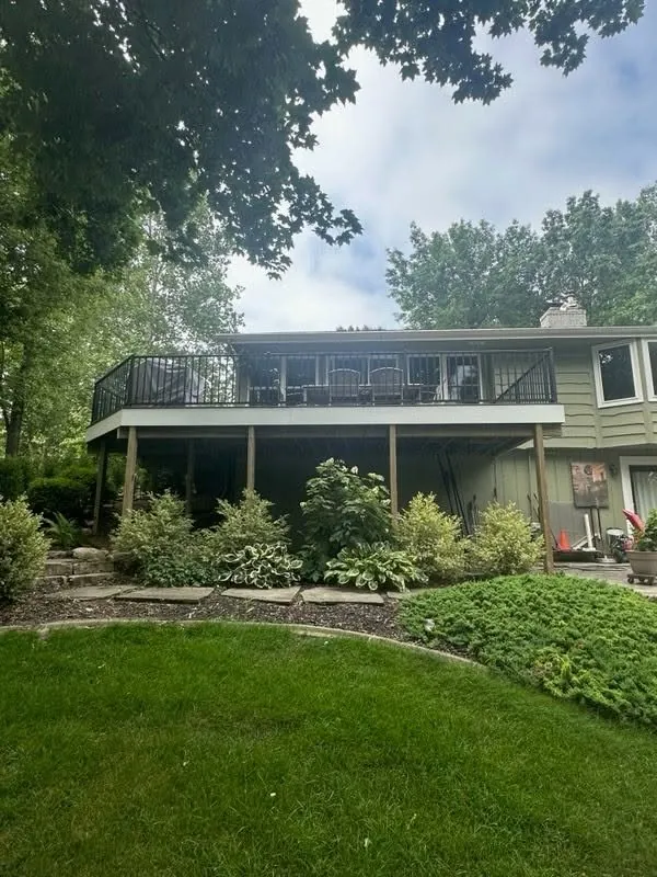 Elevated Trex Deck with Black Railings & Azek Fascia — thumbnail 2