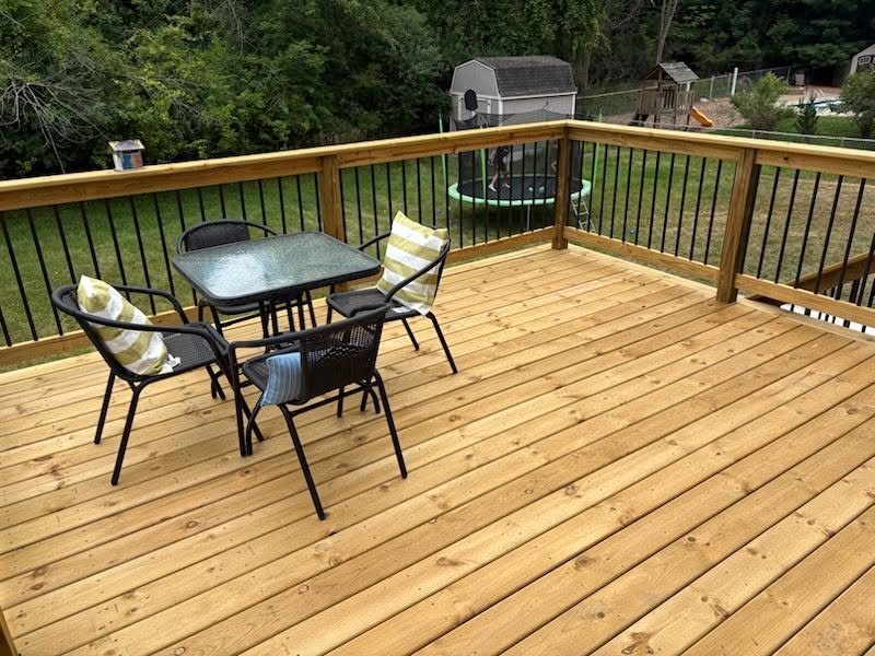Two-Story Deck with Staircase & Concrete Patio
