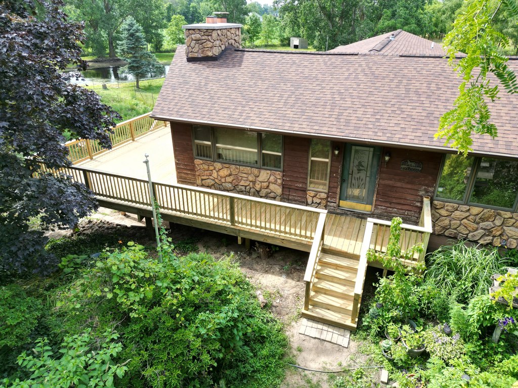 Wraparound Pressure-Treated Deck with Dual Staircases — thumbnail 2