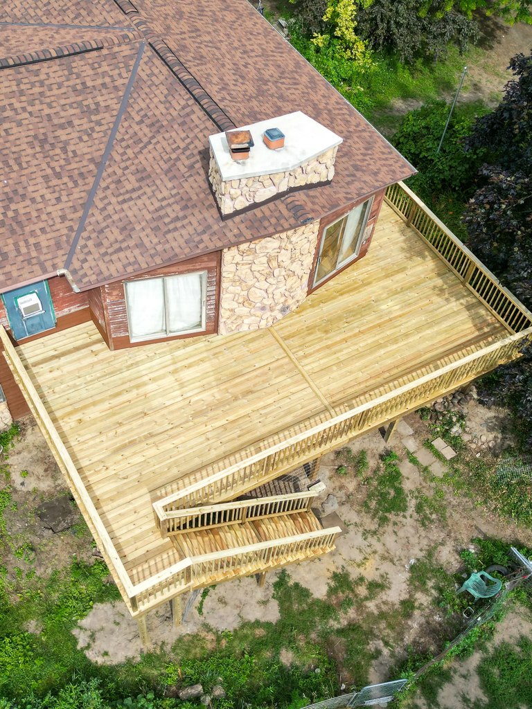 Wraparound Pressure-Treated Deck with Dual Staircases — thumbnail 3