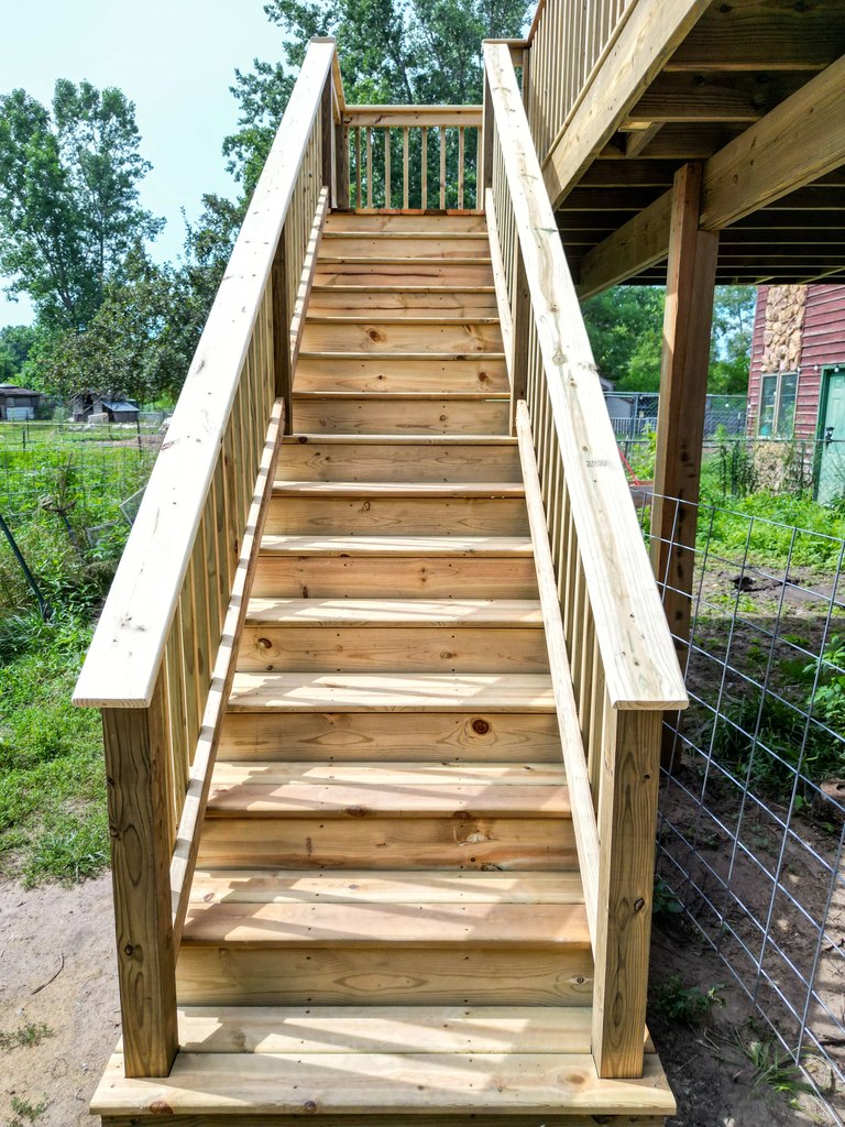 Wraparound Pressure-Treated Deck with Dual Staircases — thumbnail 4