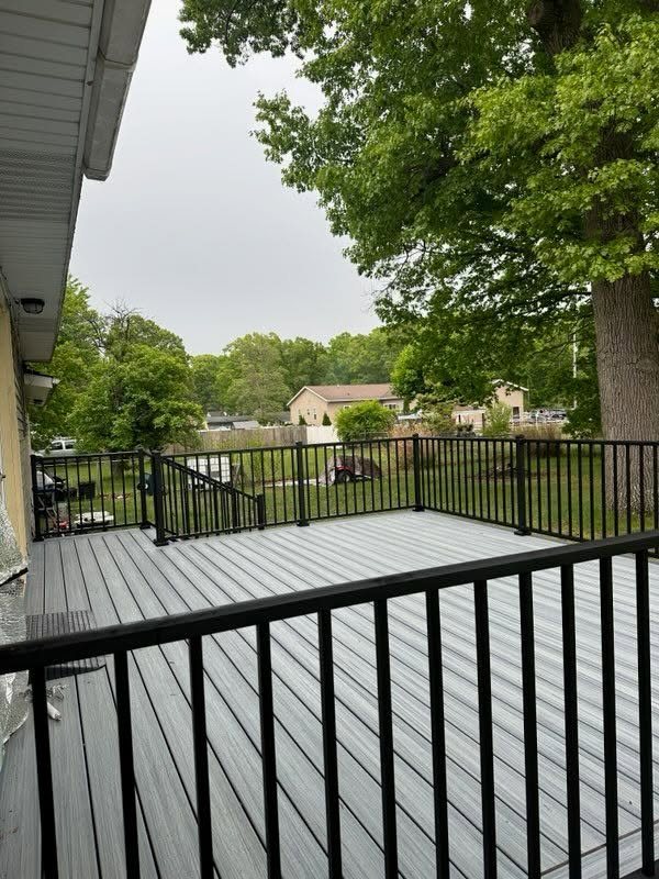 Gray Composite Deck with Black Railings — thumbnail 3