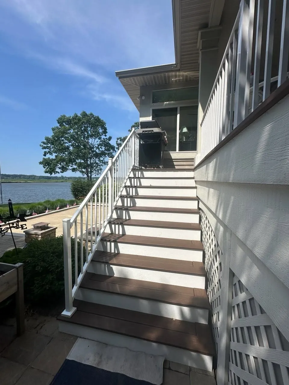 Waterfront Trex Deck with White Westbury Railing — thumbnail 3